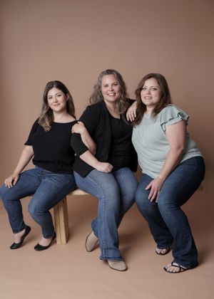 posed image of three woman