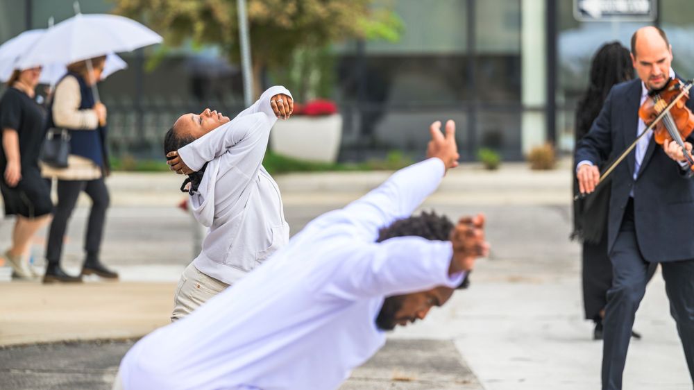 A person in white performs a series of dynamic martial arts kicks in an outdoor setting.