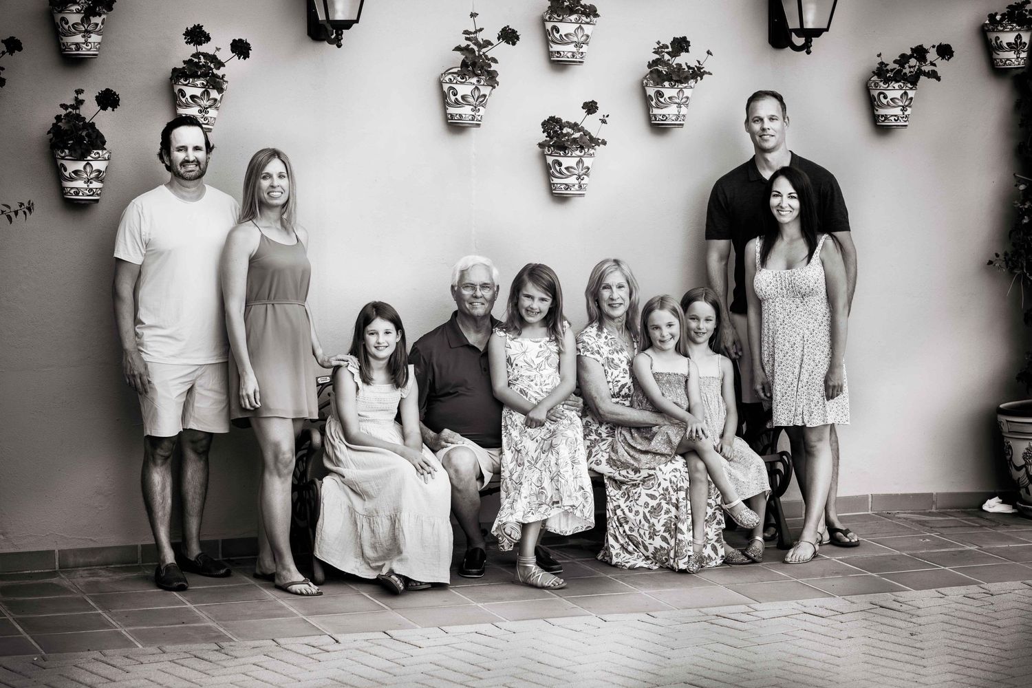 A large family photo capturing their summer vacation in Marbella.