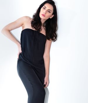 a photo by a professional photographer of a professional model during a model or fashion photo session in lingerie