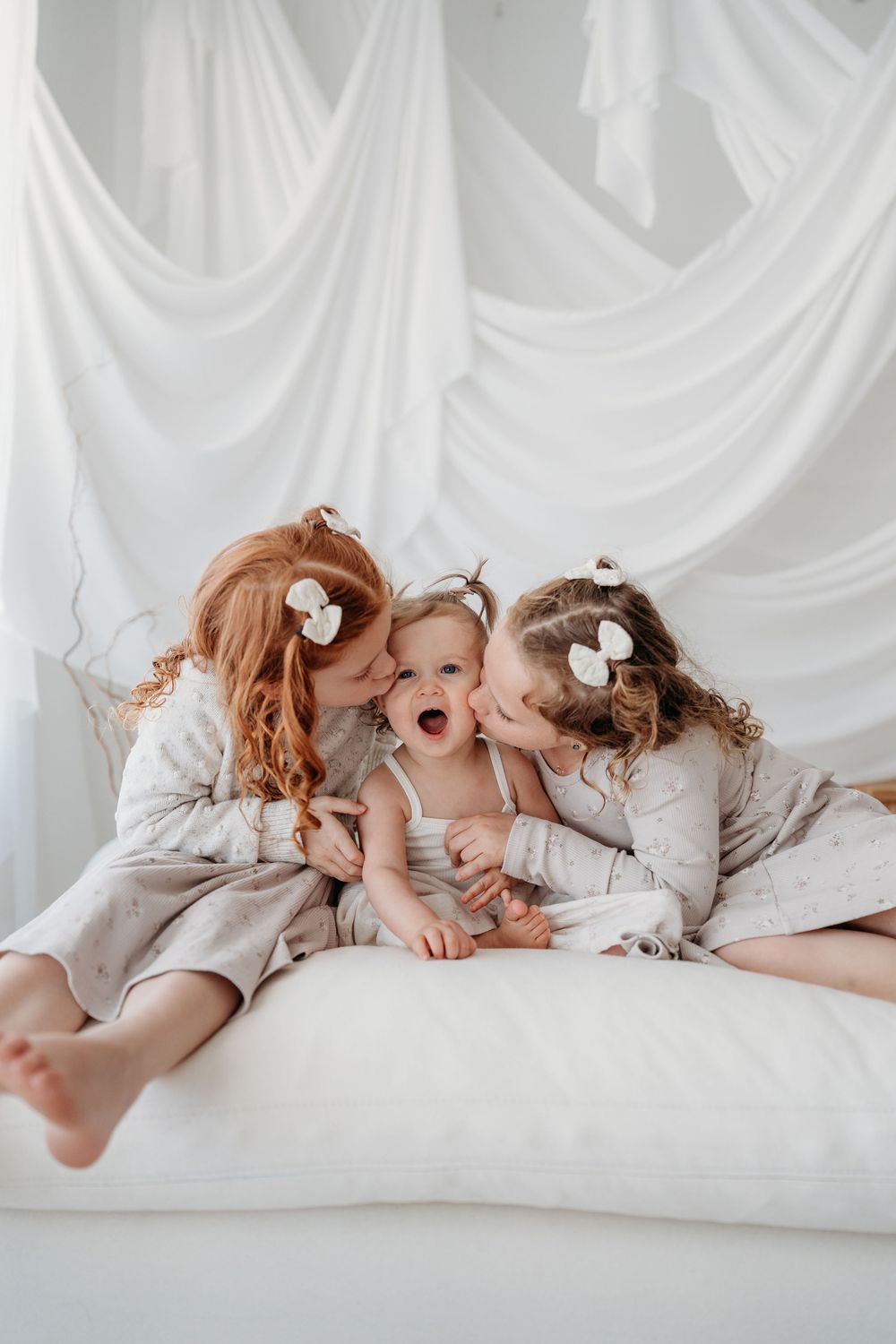 Three young sisters in family photography session.