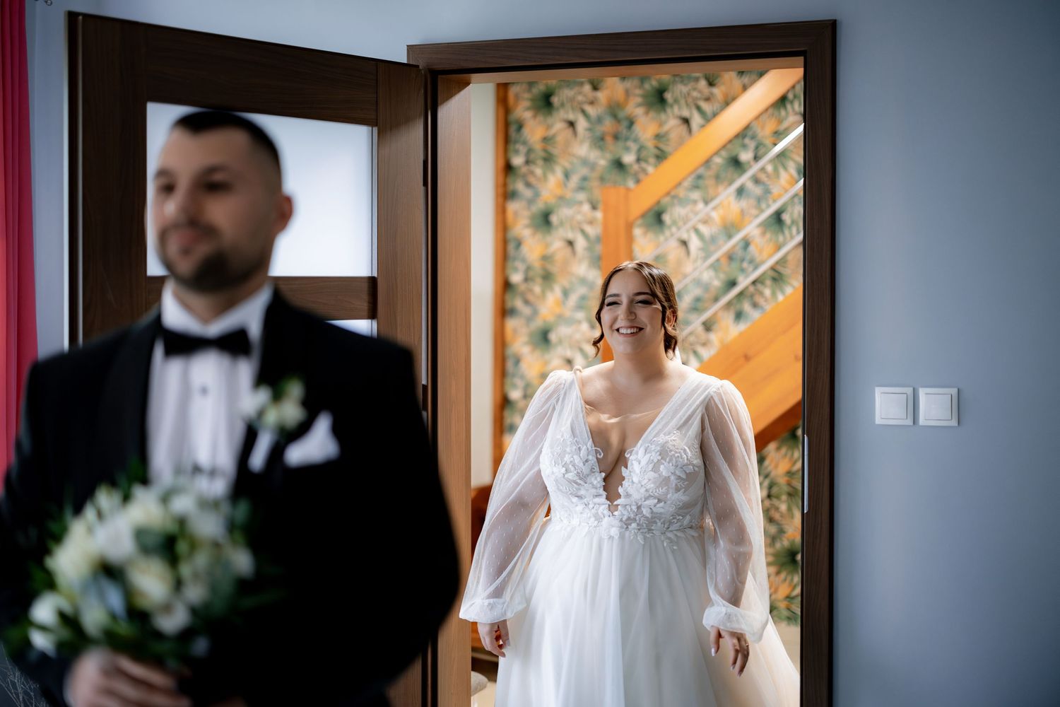 A romantic first look moment between a couple before their wedding ceremony.