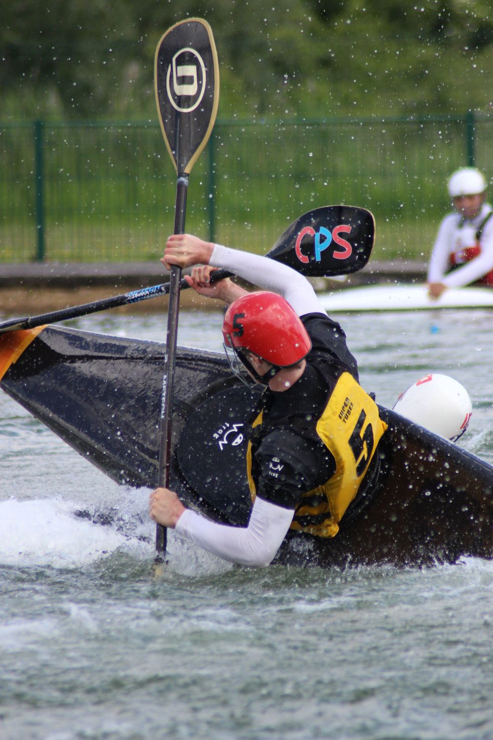 Photo d'un sportif dans un canoé, photo réalisé avec les jeunes du Lycée Frédéric Ozanam à Cesson-Sévigné