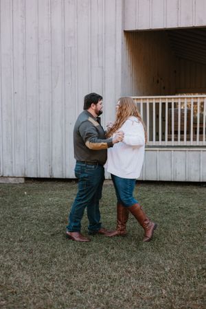 Engagement session with couple dancing