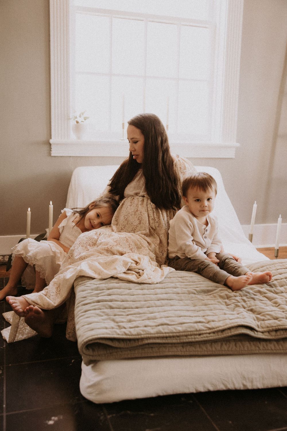 A series of warm-toned photos showing people relaxing on a cozy quilted bed in natural window light.