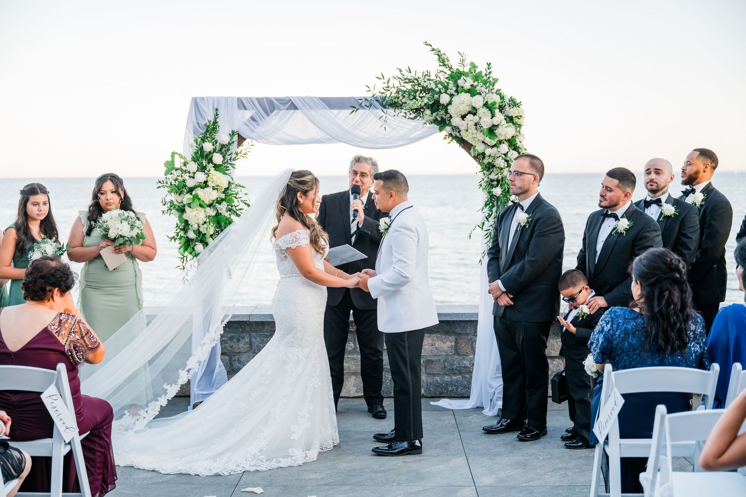 A sequence of wedding ceremony moments shown in a horizontal filmstrip style collage.