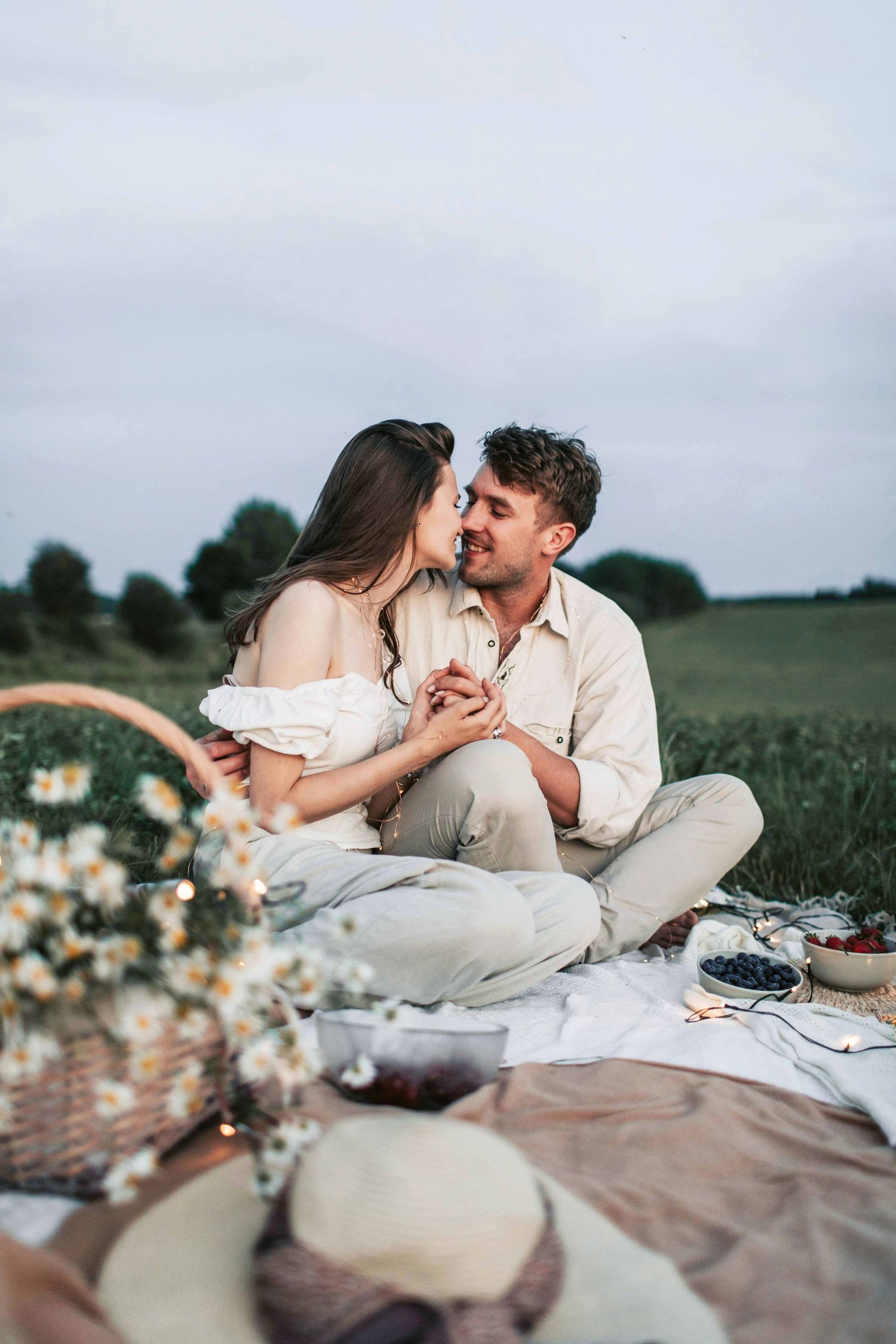An adventurous couple pose for an engagement photo