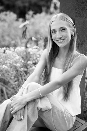 Black and white portrait series showing joyful expressions and natural poses.
