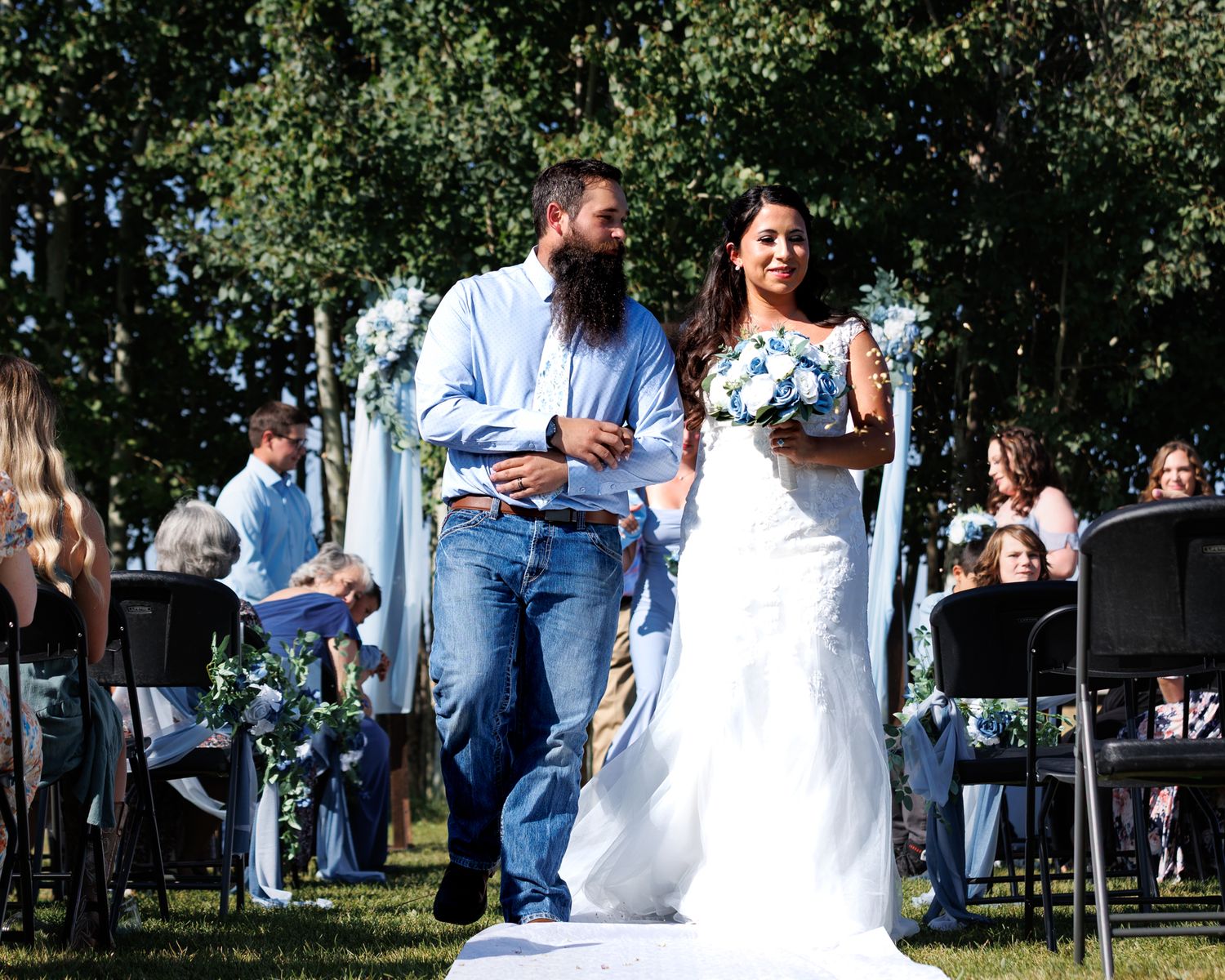 Montana bride and groom walking down the isle after saying I do.