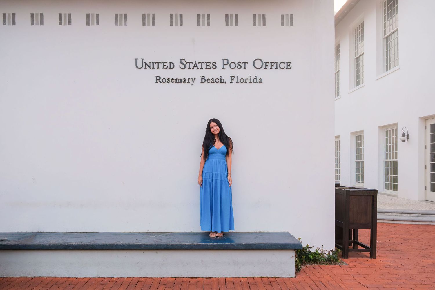 A series of minimalist architectural photographs showing white walls and blue dress details against clean building exteriors.