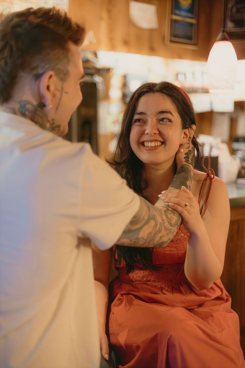 Cozy coffee shop engagement photos in downtown Parker, Colorado.