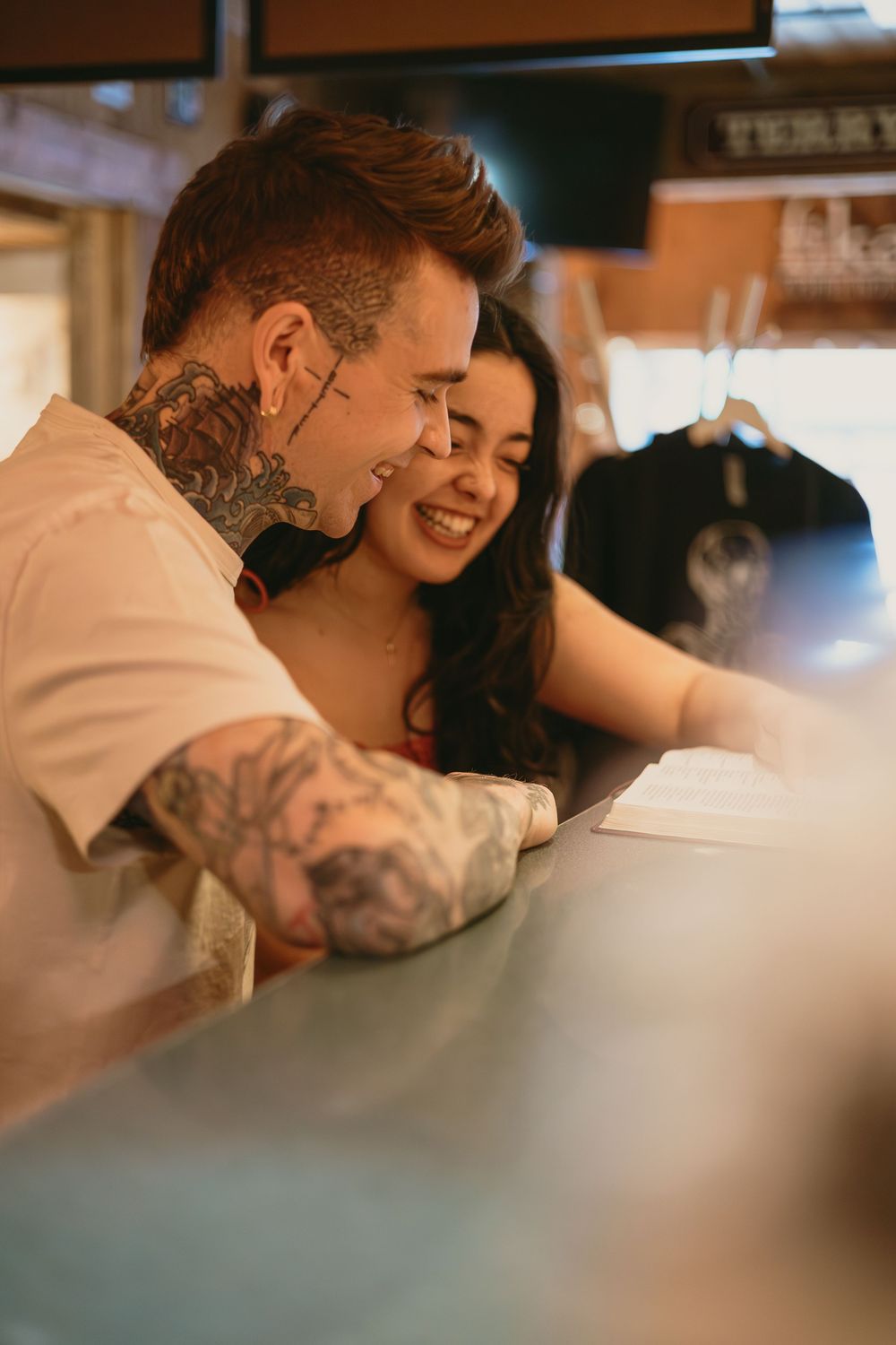 Cozy coffee shop engagement photos in downtown Parker, Colorado.