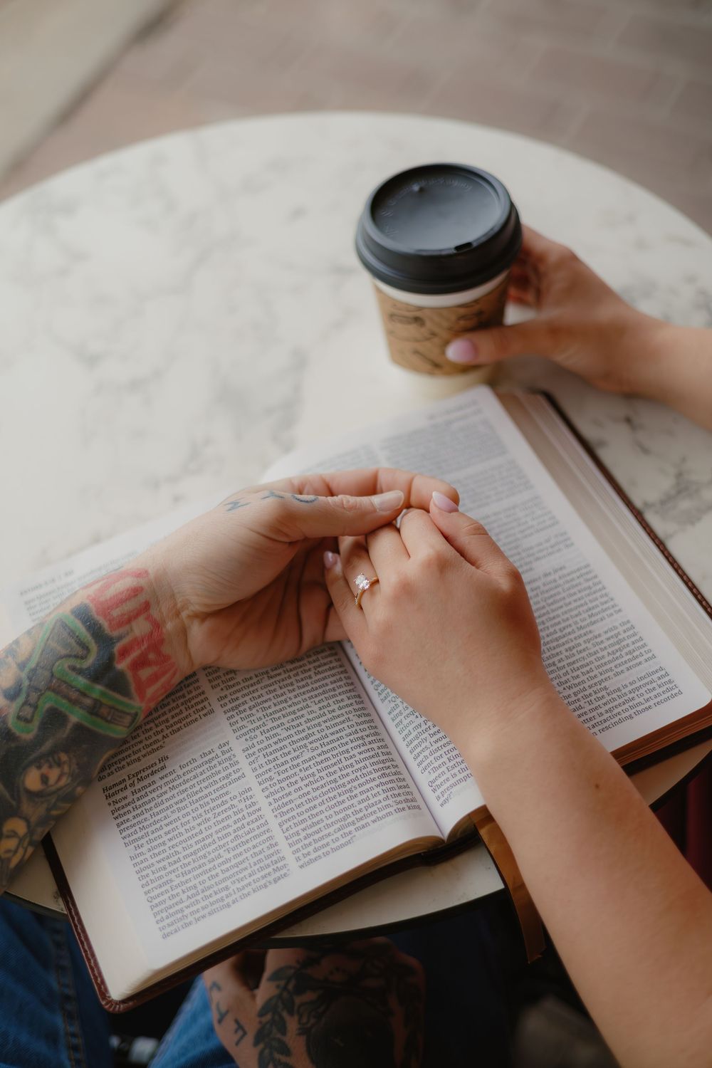 Cozy coffee shop engagement photos in downtown Parker, Colorado.