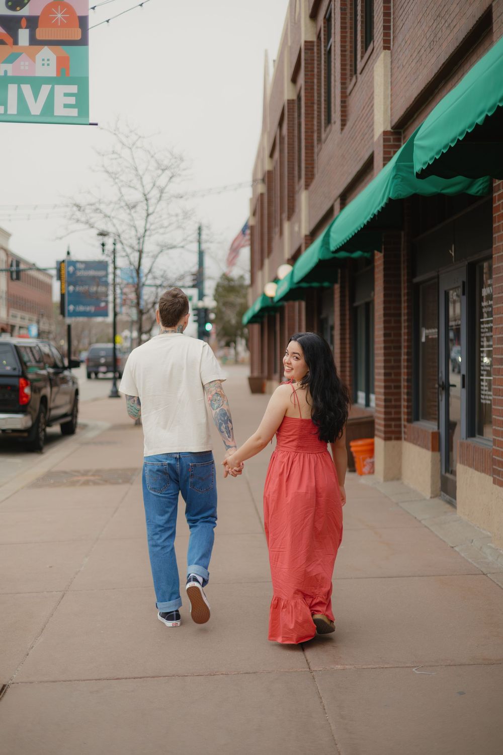 Cozy coffee shop engagement photos in downtown Parker, Colorado.