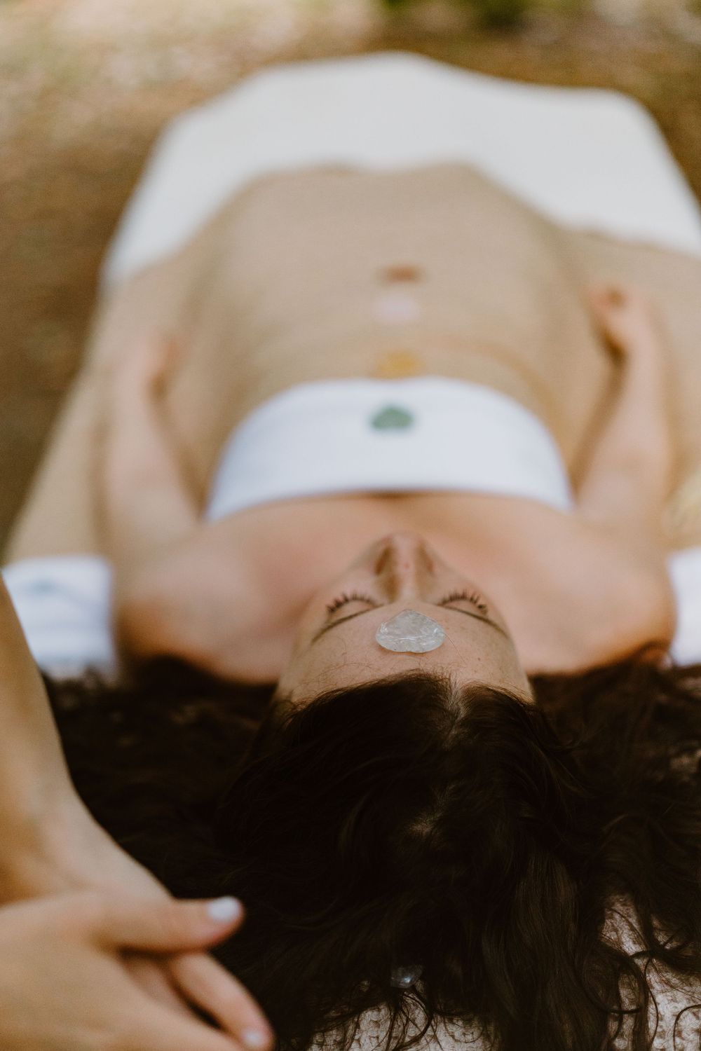 A series of relaxing massage therapy treatments shown in soft, warm lighting.