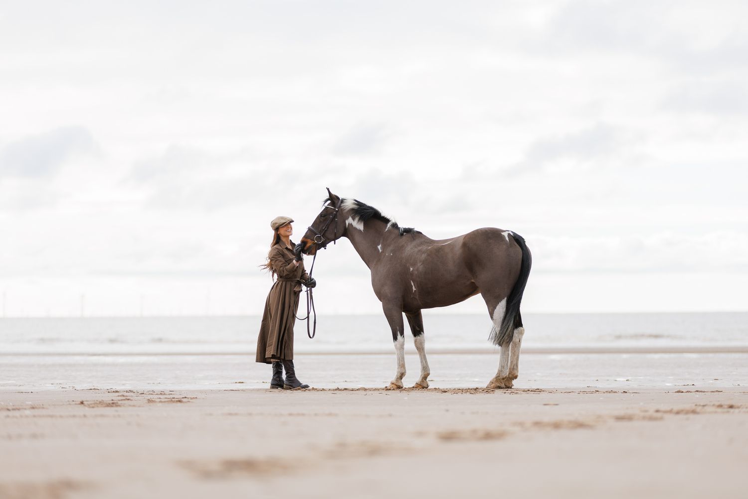 A series of seven photos showing a white horse and rider interacting at a wooden fence in an outdoor setting.