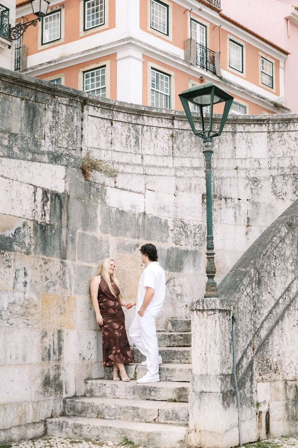Elegant destination wedding couple photographed in the streets of Lisbon, Portugal