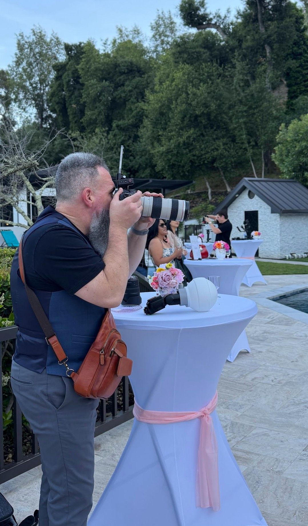 Behind-the-scenes event photography captured by Raymond C. Hansell Photography in California.