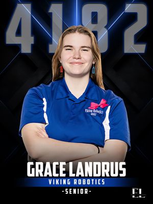 Grace Landrus, Viking Robotics senior team member 4182, poses in blue polo with arms crossed.
