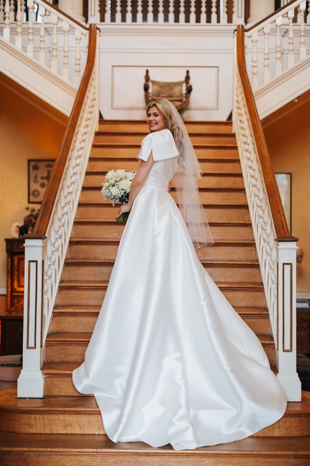 beautiful bride on big staircase