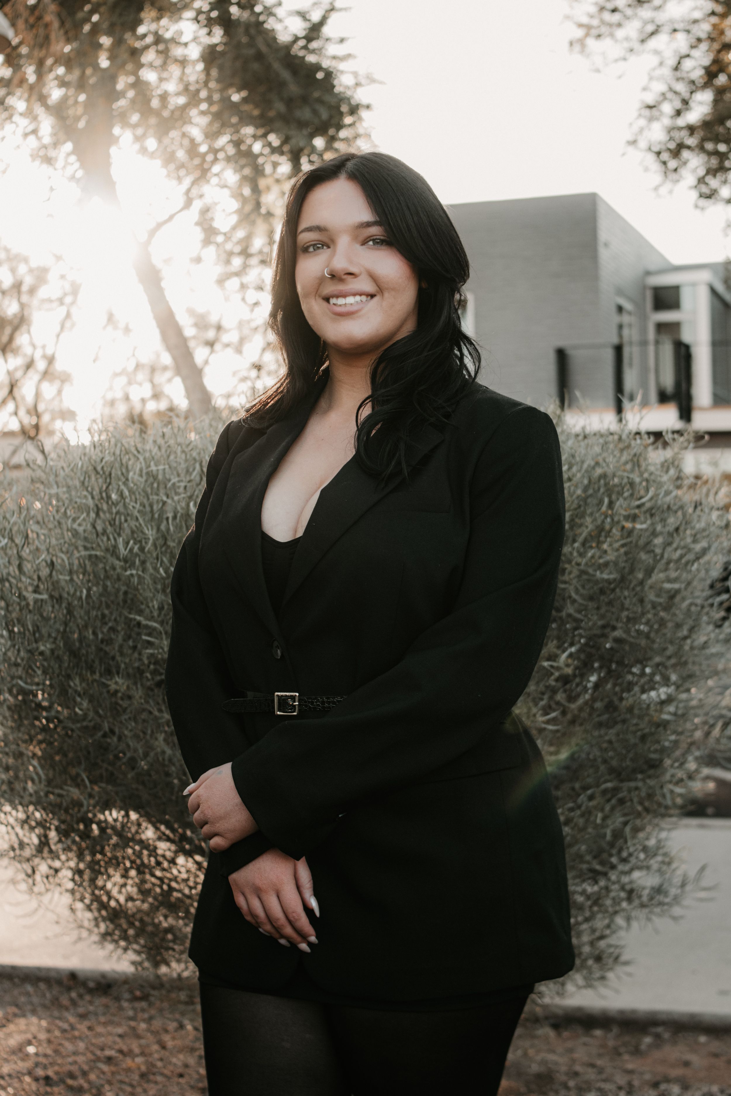 Senior graduate photographed in the Arizona desert during golden hour.