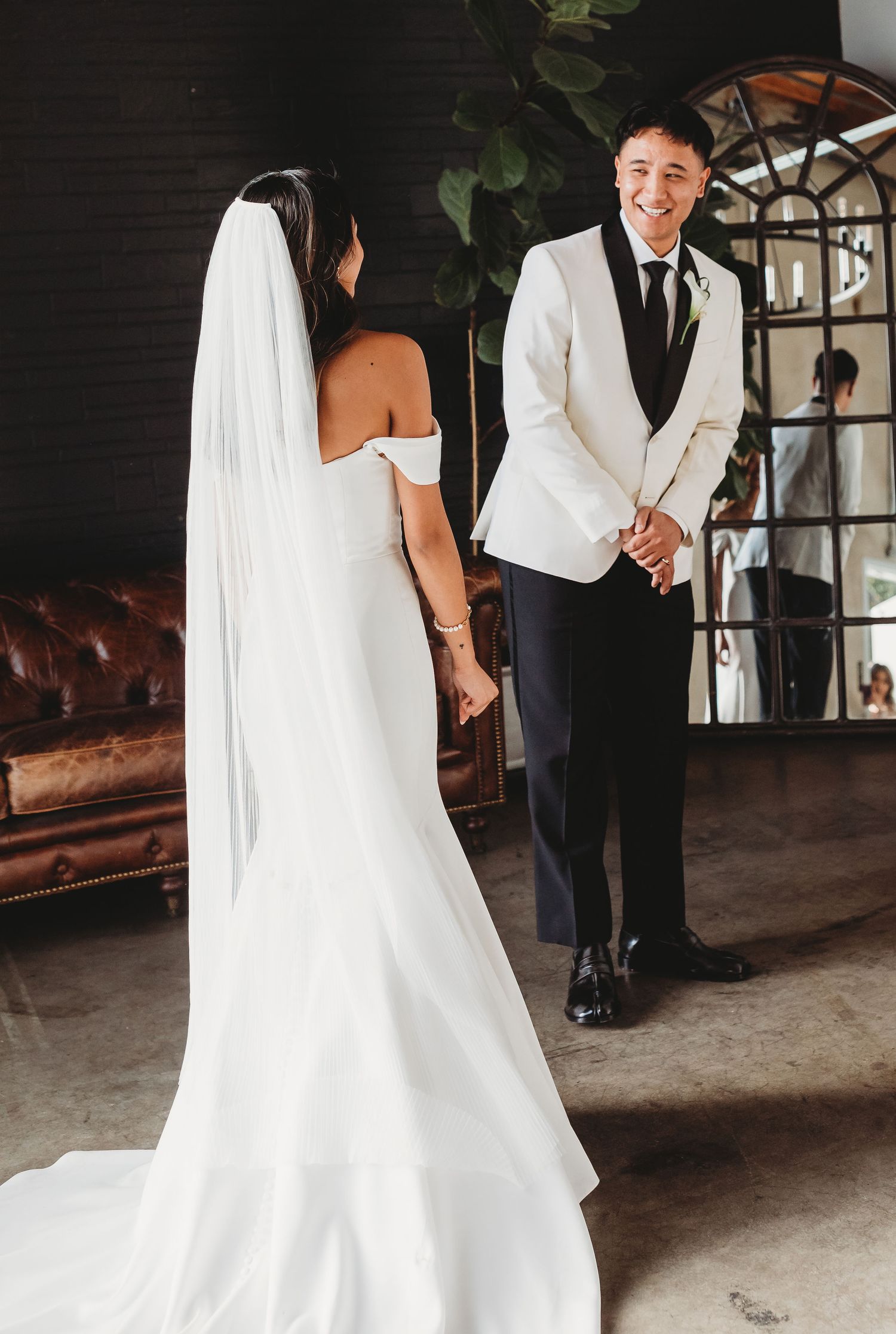 A sequence of wedding portraits shows the flowing movement of a white bridal gown during a first look moment.