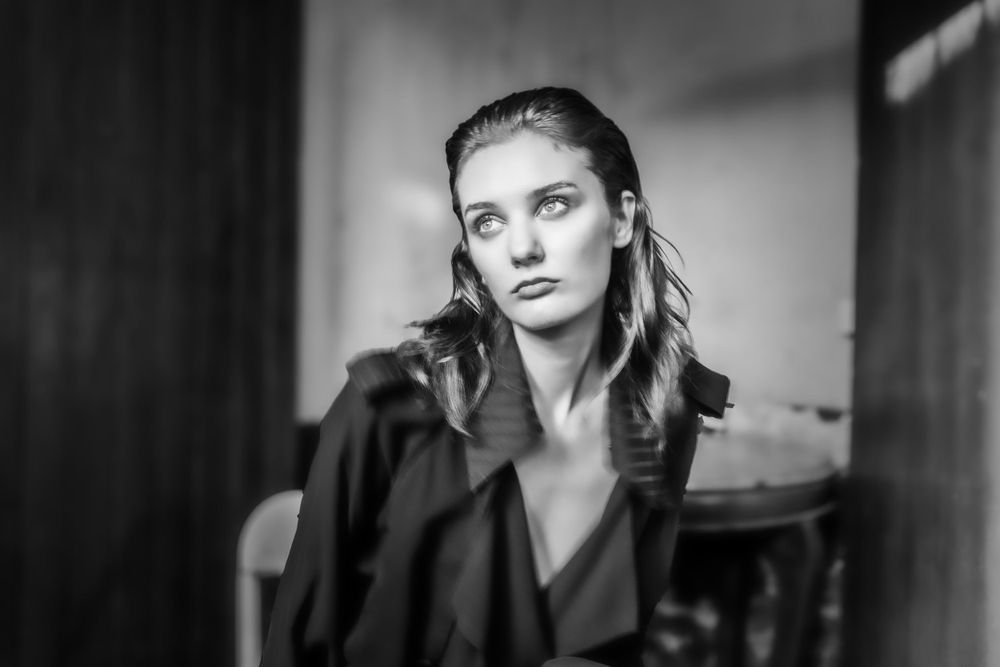 Black and white editorial portrait photographed in a Bangkok hotel by John Ferguson