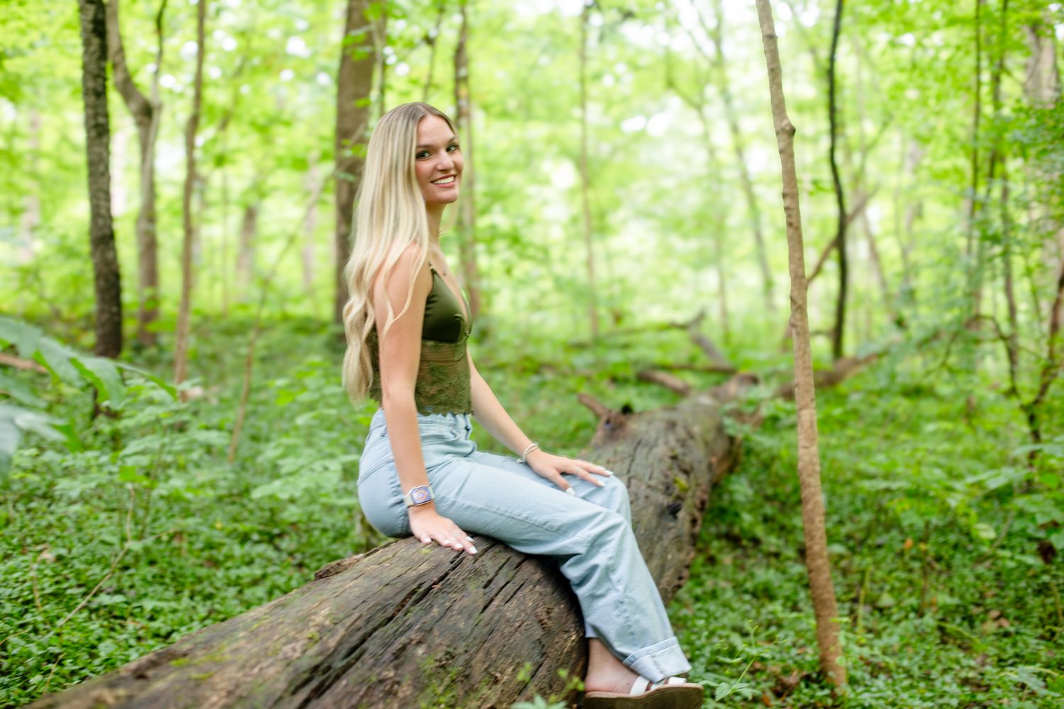 Outdoor senior photo of teen girl at Sharon Woods Cincinnati with natural light and polished styling for premium clients