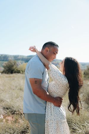 Couple posing in Paulo Duro Canyon in Canyon Texas.