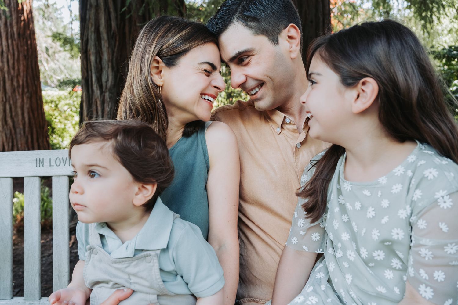 Three intimate family photos showing tender moments of closeness and affection in an outdoor garden setting.
