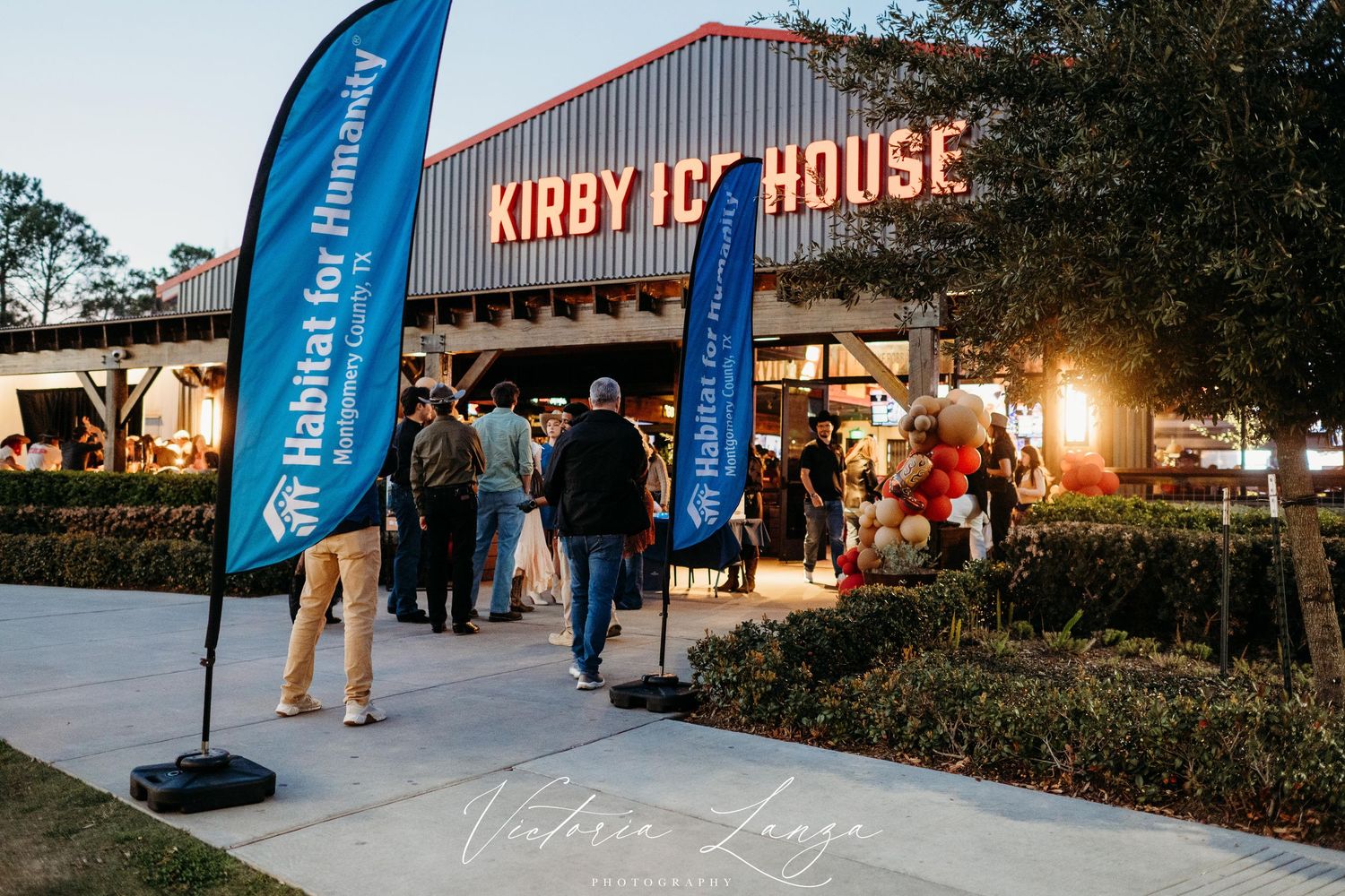 Guests arriving at Hats for Homes charity event benefiting Habitat for Humanity Montgomery County at Kirby Ice House The Woodlands