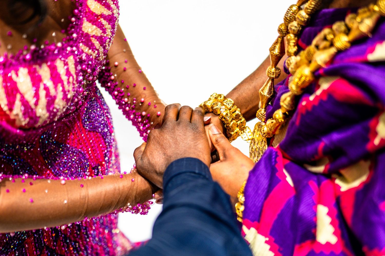 Colorful celebration with vibrant pink and gold glitter sparkles creating a festive atmosphere at an event.