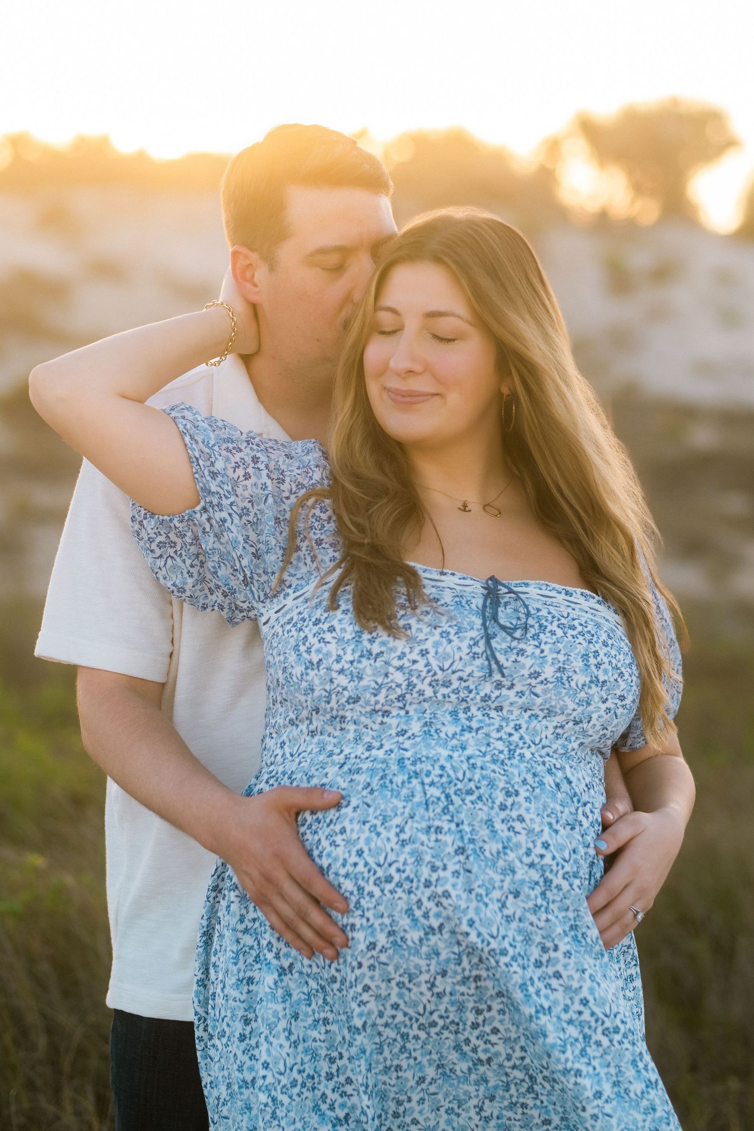 Jacksonville maternity photography session with low tide shoreline reflections at Guana Preserve