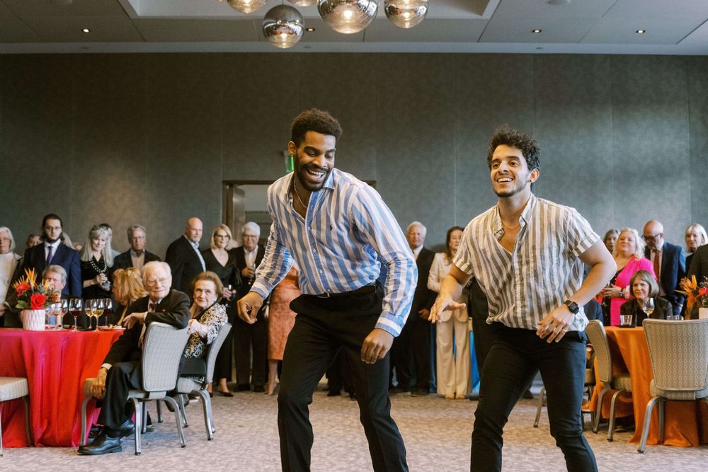 Two male performers dancing to latin music for the Cuban themed party in honor of Glenna and Dick Tanenbaum