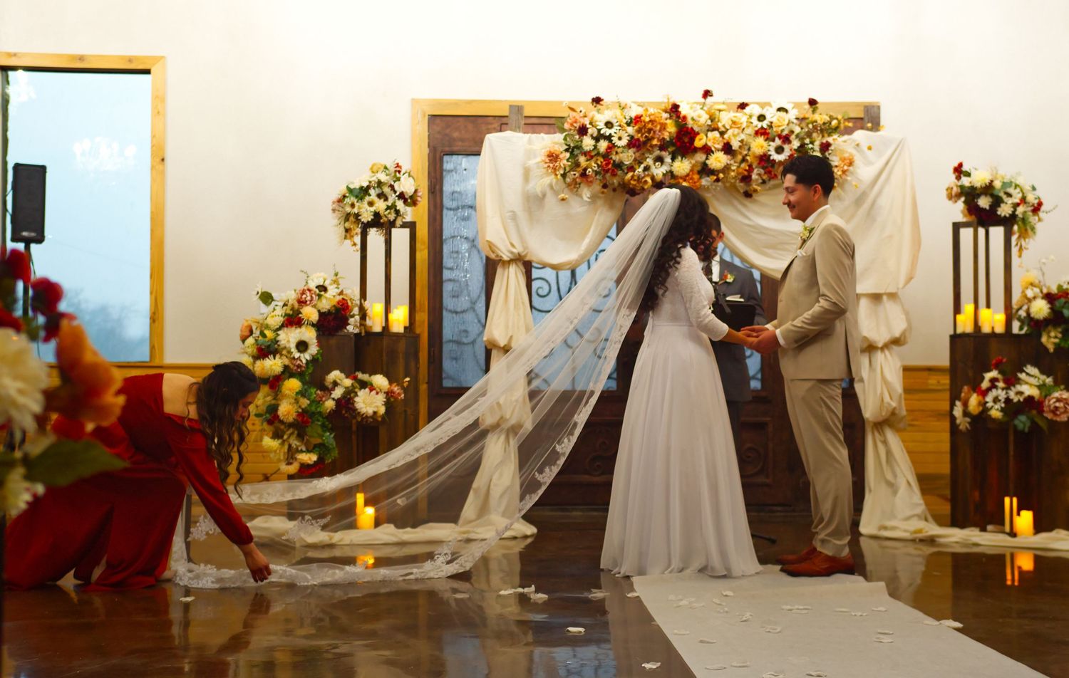 Wedding photo involving bride, groom and bridesmaid.