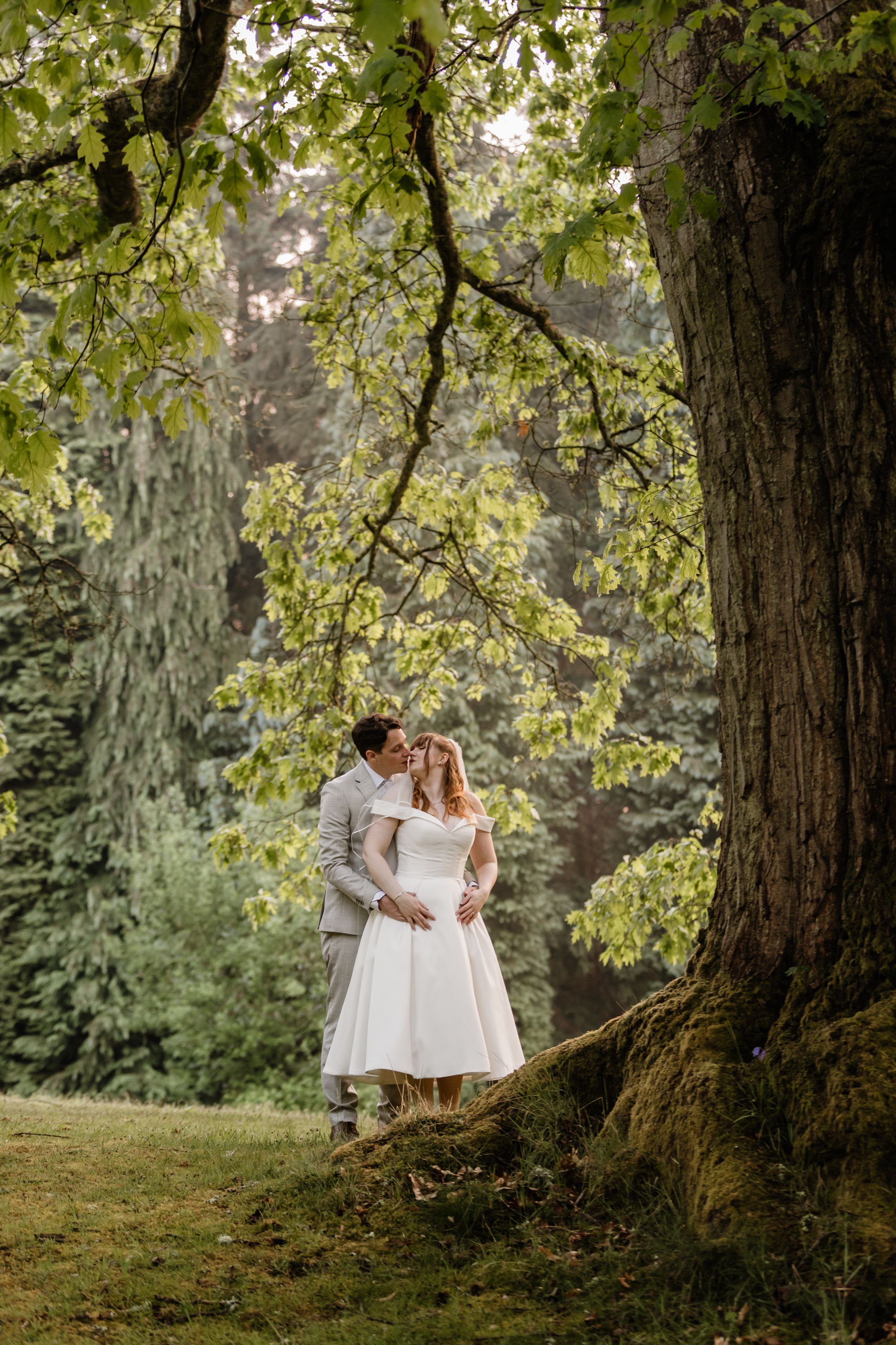 Couple under oak tree at Barnett Hill Hotel