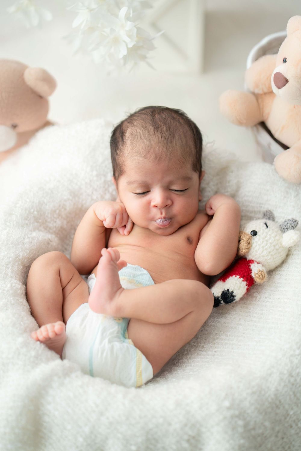 Newborn baby girl sleeping peacefully – studio photography by Photo Kids, Hyderabad