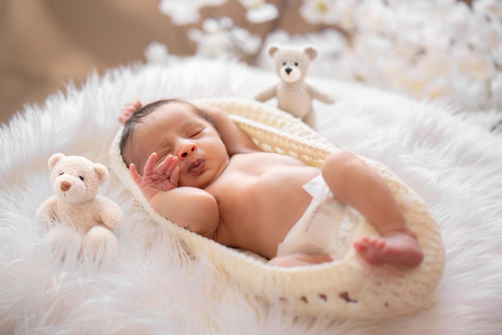 Newborn baby girl sleeping peacefully – studio photography by Photo Kids, Hyderabad