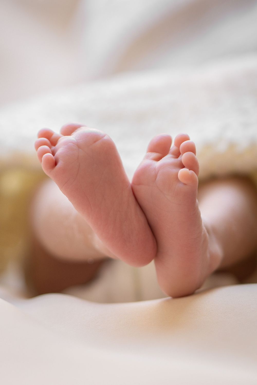 Newborn baby girl sleeping peacefully – studio photography by Photo Kids, Hyderabad