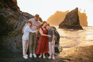 Family standing together during their adventure family photoshoot at Olympic National Park near Seattle, Washington