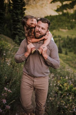 Dad and child together during their adventure and family photoshoot at Mt. Rainier National Park near Seattle, Washington