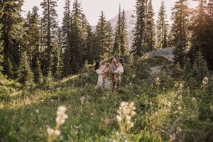 Family standing together during their adventure and family photoshoot at Mt. Rainier National Park near Seattle, Washington