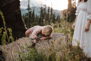 Closeup of Mom and child together during their adventure and family photoshoot at Mt. Rainier National Park near Seattle, Washington