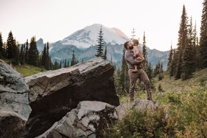 Dad and daughter standing together during their adventure and family photoshoot at Mt. Rainier National Park near Seattle, Washington