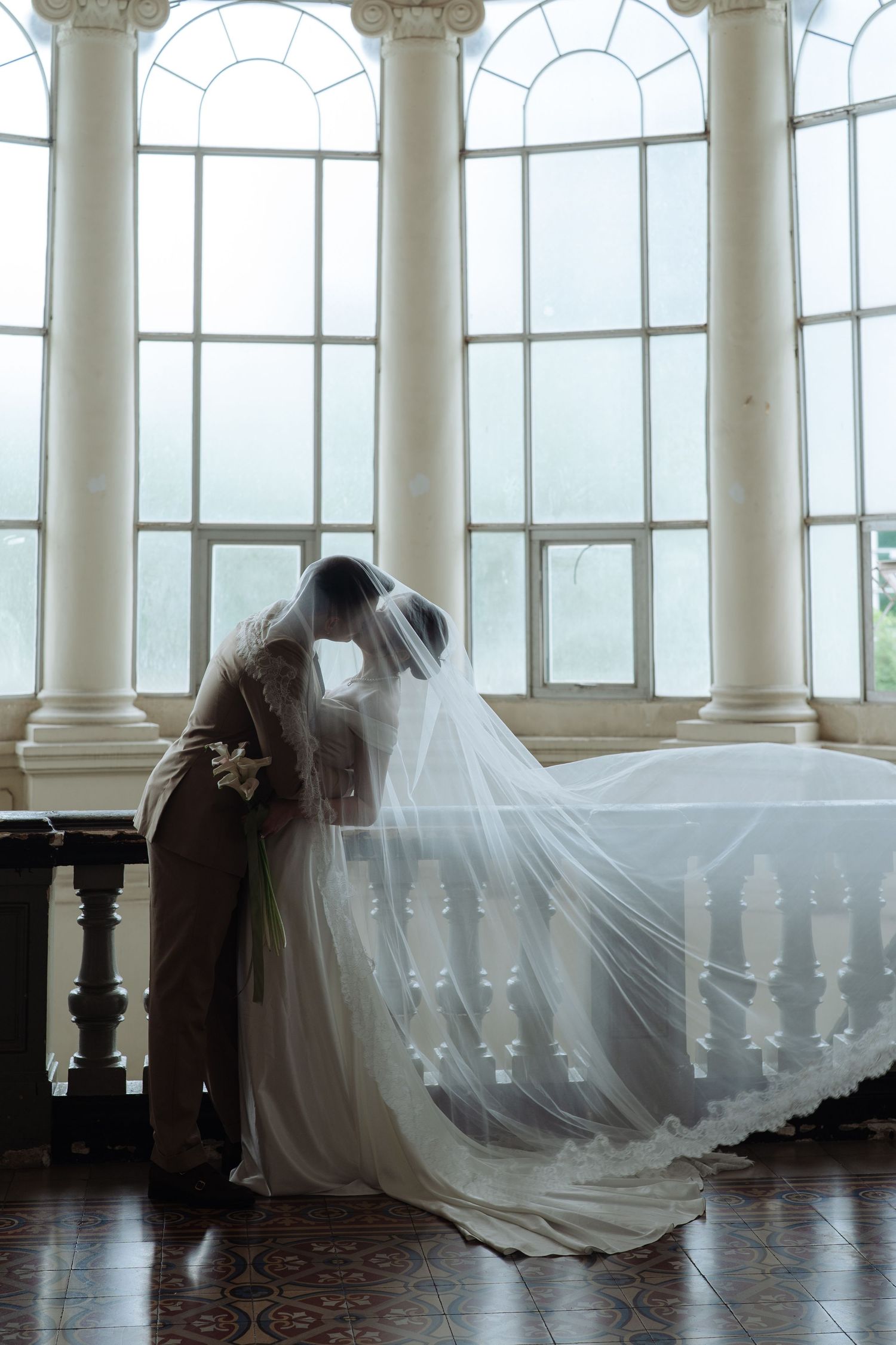 Ho Chi Minh prewedding photoshoot at Notre Dame Cathedral – editorial couple portrait in warm daylight