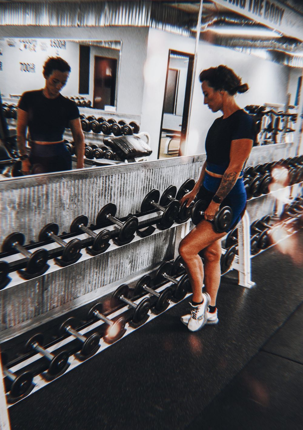 Woman Standing at weights