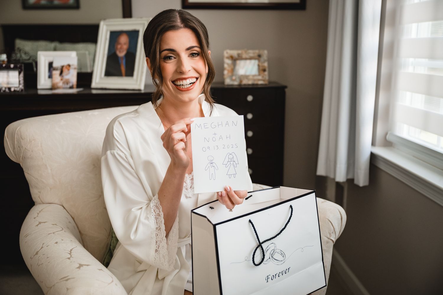 Bridal preparation scene with white robe and wedding day accessories.