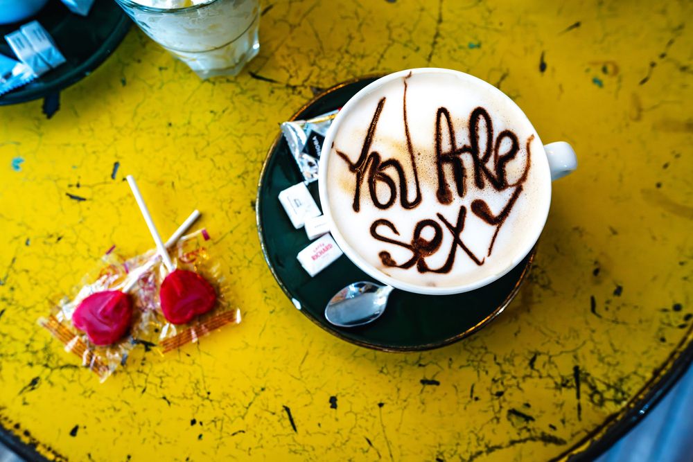 A cappuccino in France with words written You are sexy.