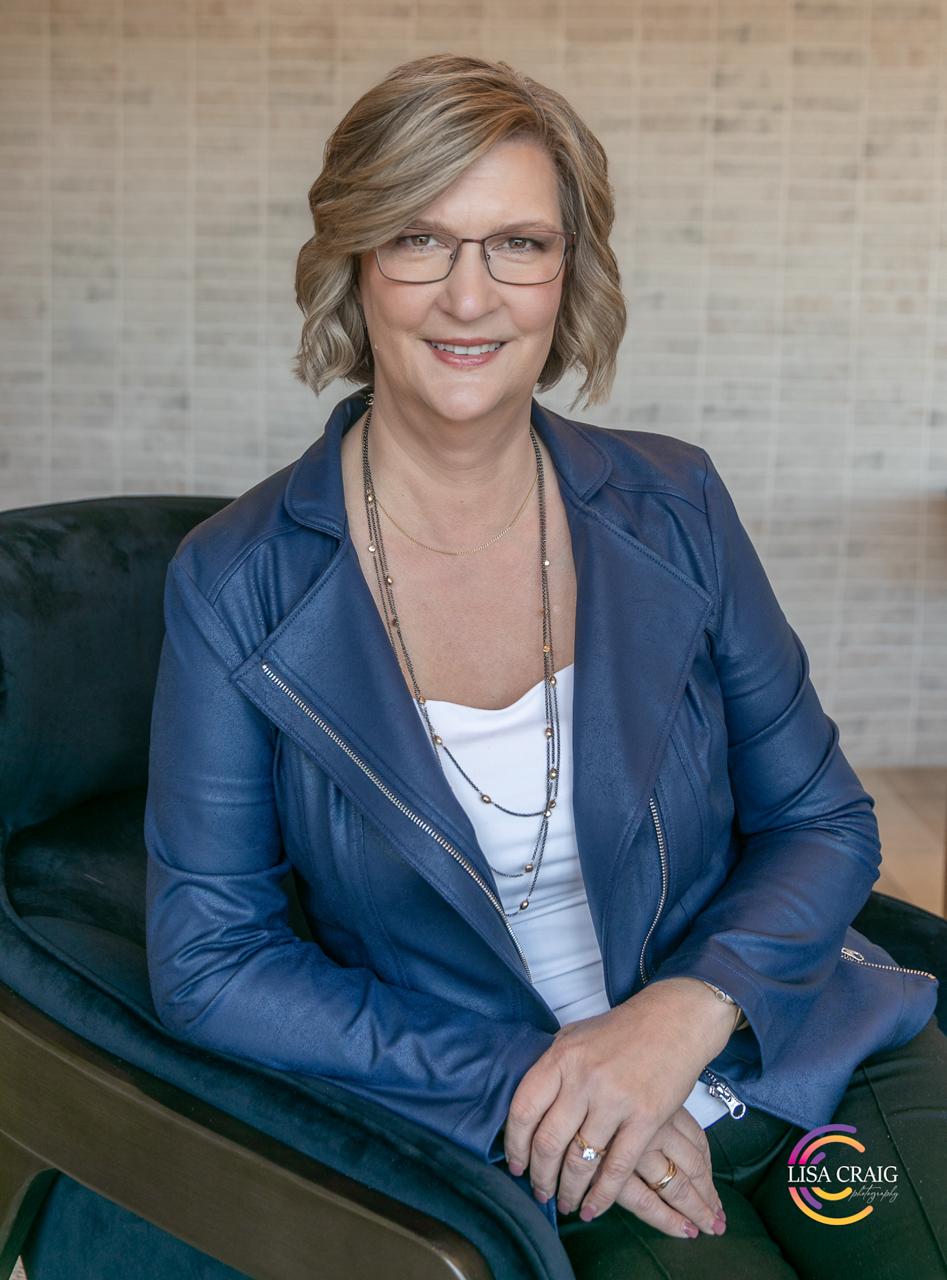Authentic headshot photography session in Denver, Colorado showing a professional feeling comfortable and confident in front of the camera d