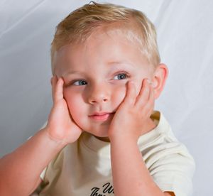 A series of expressive portrait shots showing playful facial expressions and hand gestures against a white background.